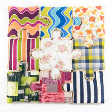 Neunteilige Liege-/Tobefläche im Puzzle-Design