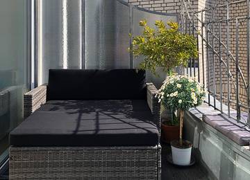 Bequemes Lounge Sitzkissen mit Rücklehne nach Maß in der Farbe Sunny Noir